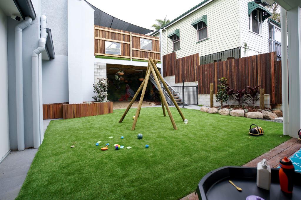 The grassy outdoor play area at Little Locals Auchenflower Early Learning Centre.